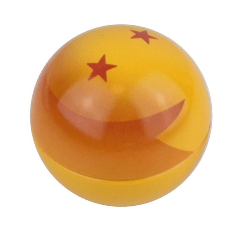 Une boule jaune avec 2 étoiles rouges sur fond blanc