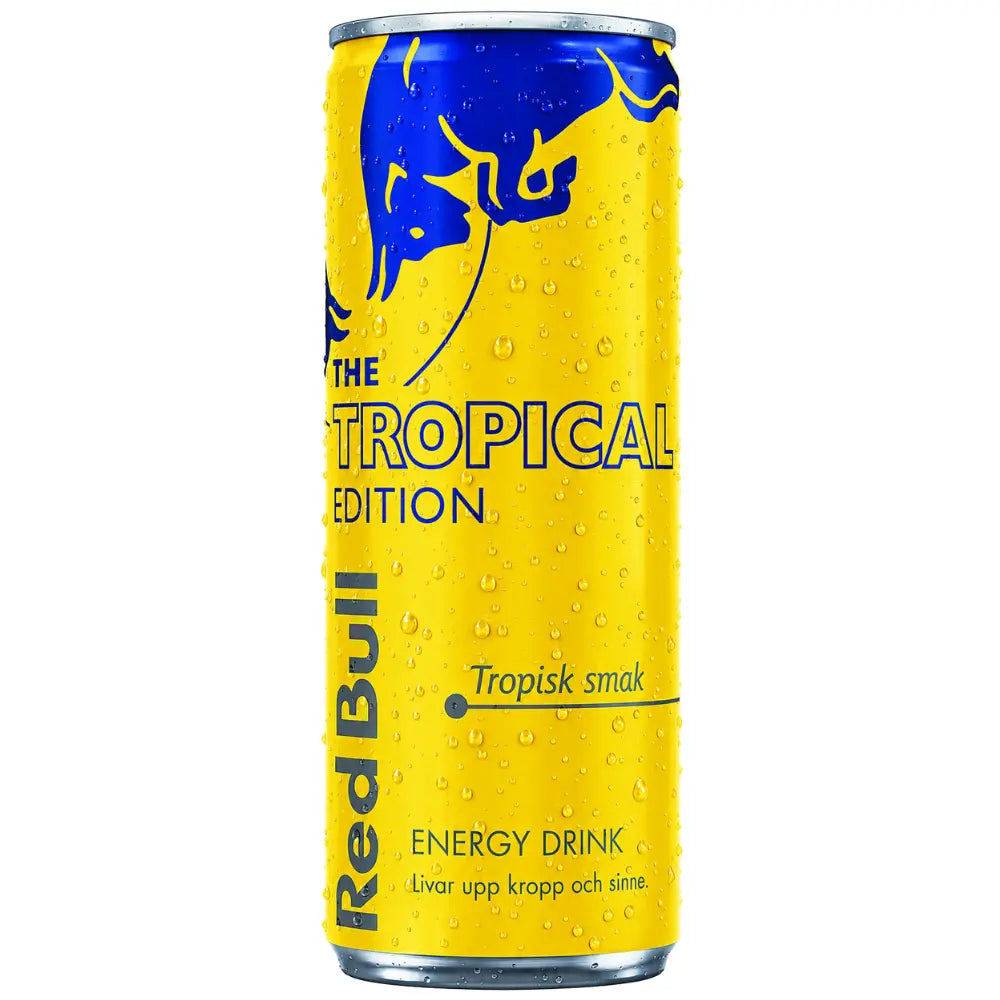 Canette jaune Red Bull Tropical Edition, boisson énergisante au goût tropical avec gouttes de fraîcheur, ananas et fruit de la passion.