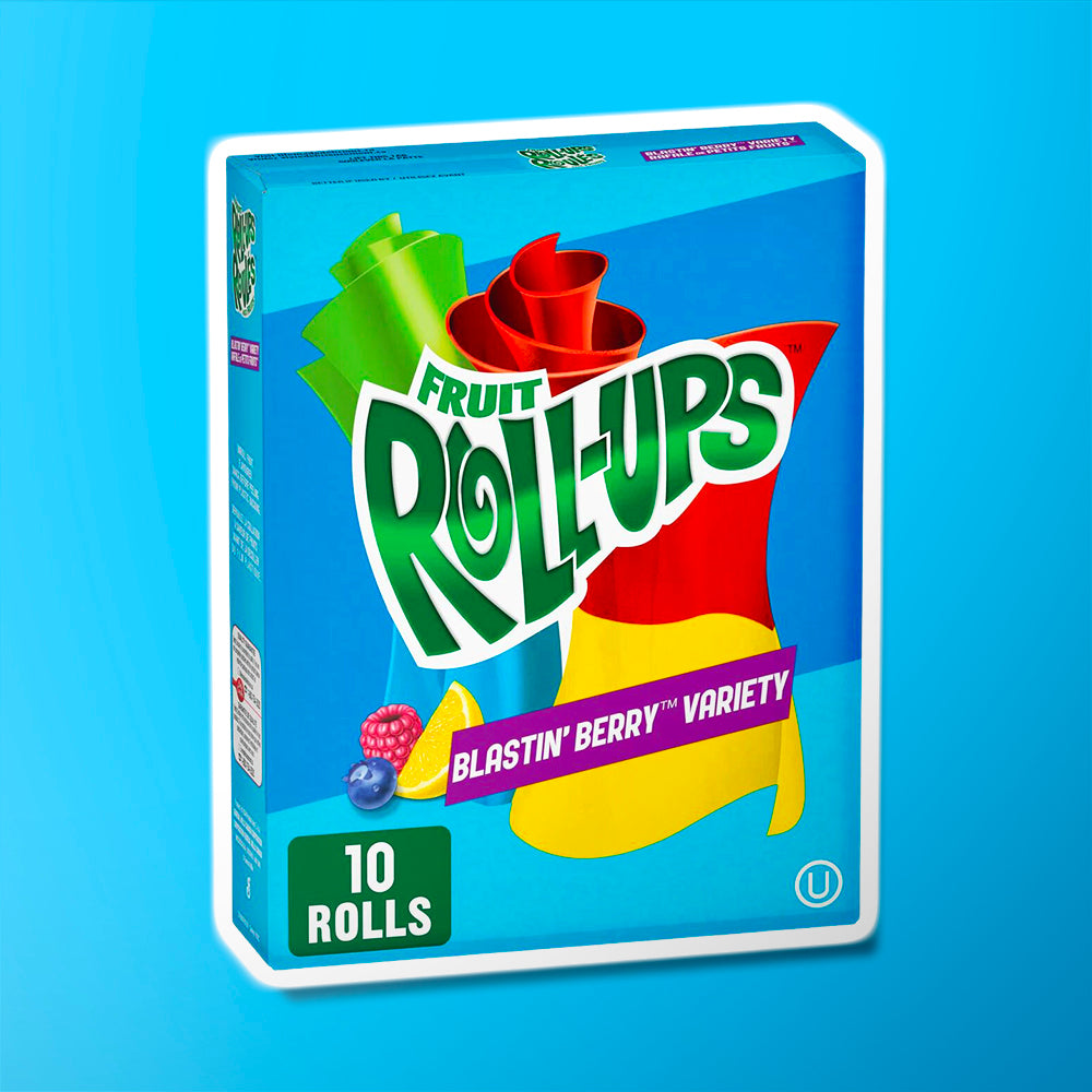Un paquet bleu sur fond bleu avec 2 bonbons vert et rouge enroulés sur eux-mêmes. En bas à gauche, une framboise, une myrtille et une tranche de citron