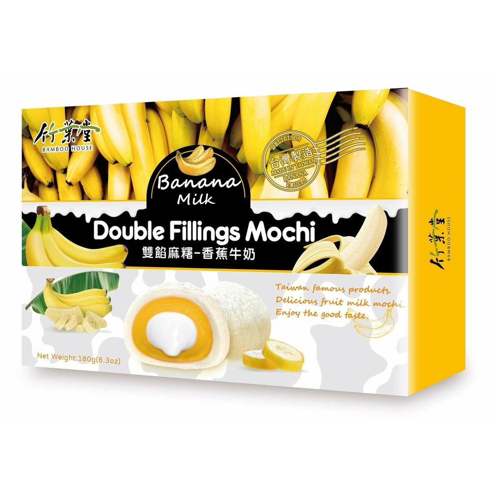 Un carton rectangulaire jaune sur fond blanc avec au-dessus des bananes et en-dessous 2 mochis blancs dont un qui est coupé et on y voit une crème 