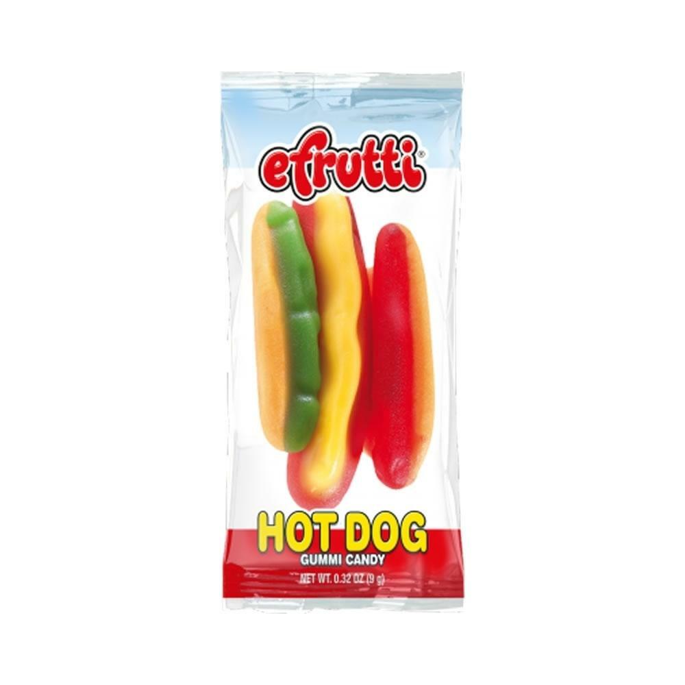 Un emballage transparent sur fond blanc, on y voit un bonbon en forme d’hot-dogs