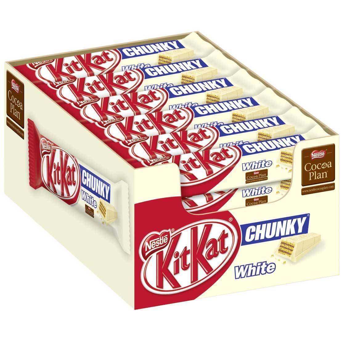 Un paquet en carton rouge et couleur crème, il est rempli d’emballage avec une barre chocolaté enrobée de chocolat blanc. Le tout sur fond blanc