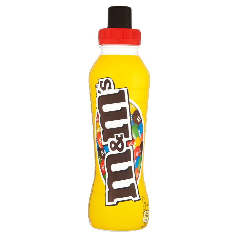 Une bouteille jaune sur fond blanc avec un couvercle rouge et brune, et au centre il y a un ovale rempli de M&M’s colorés