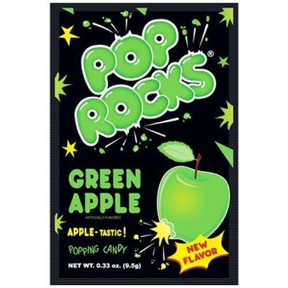 Un emballage noir sur fond blanc avec en bas à droite une grande pomme verte et autour il y a des petits éclats de bonbons verts