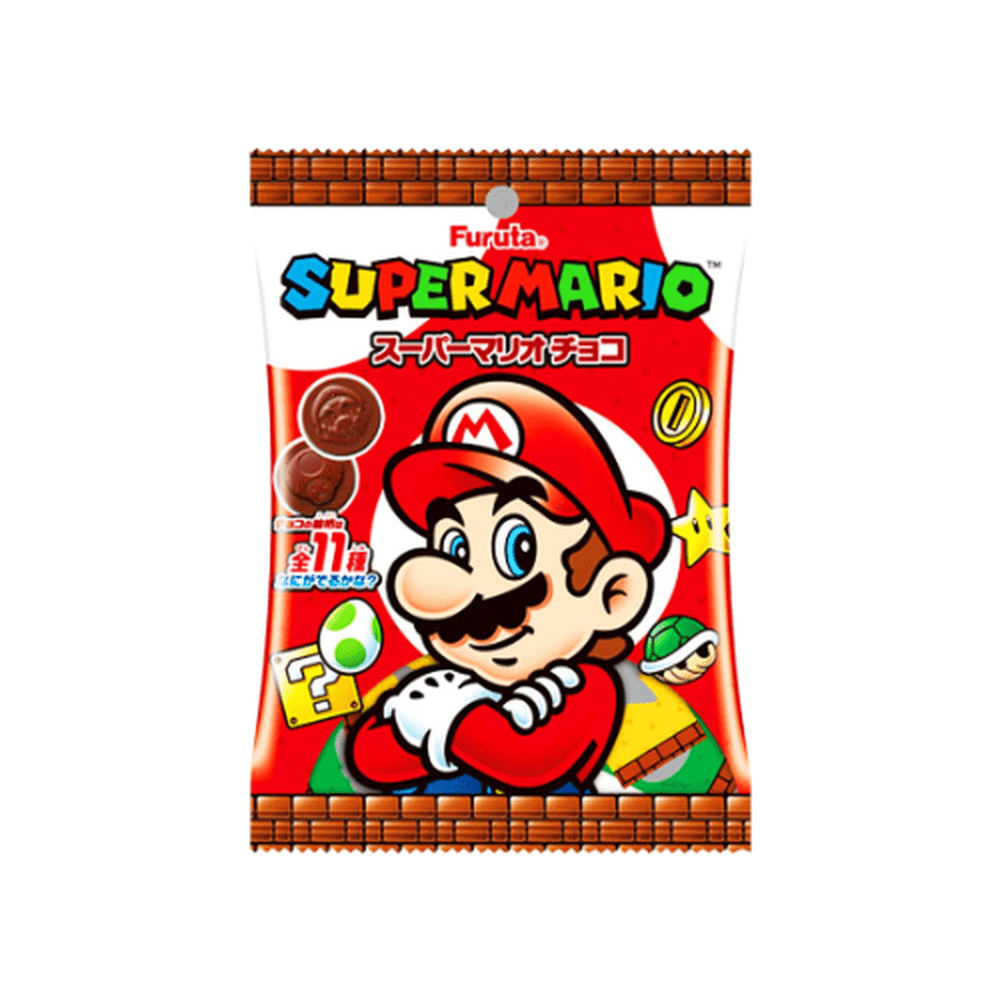 Un emballage blanc aux extrémités aux effets de briques bruns avec le personnage Mario au centre qui sourit et qui croise ses bras. Le tout sur fond blanc
